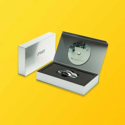 Custom CD and multimedia catalog packaging boxes with fitted disc trays and literature compartments