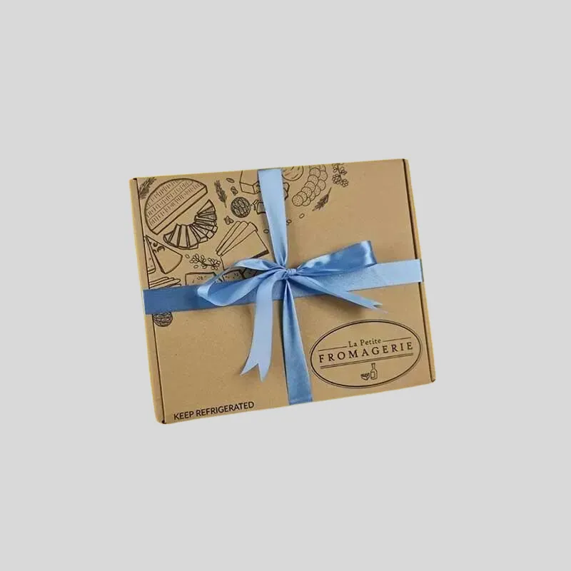 Custom corrugated cardboard gift boxes combining protective flute cushioning with decorative print finishes