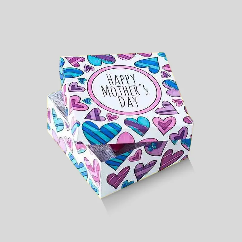 Mother's Day floral gift boxes crafted with soft-touch coating and ribbon tie embellishments