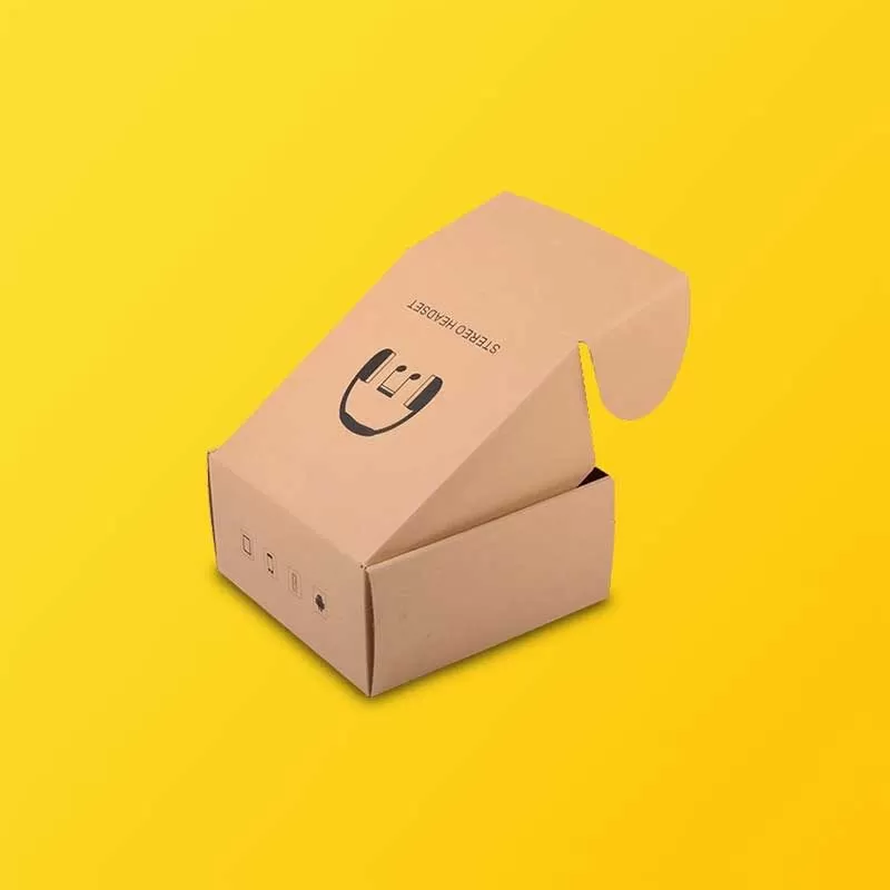 Kraft mailer box with printed pattern on yellow background