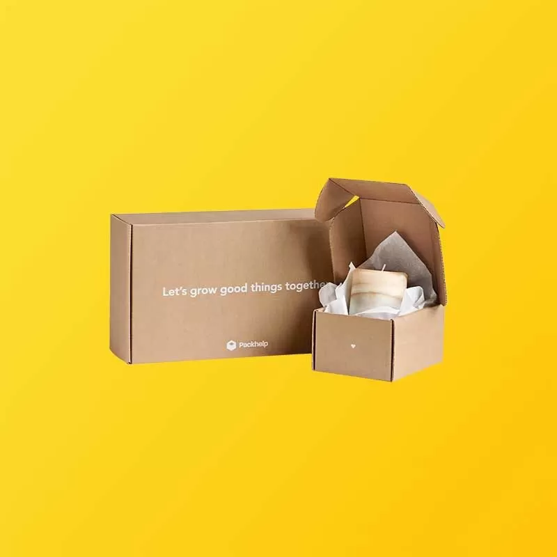 Custom kraft mailer box detail showing dust flaps and locking mechanism