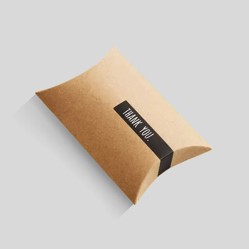 Natural kraft pillow box showing material texture and curved carton form