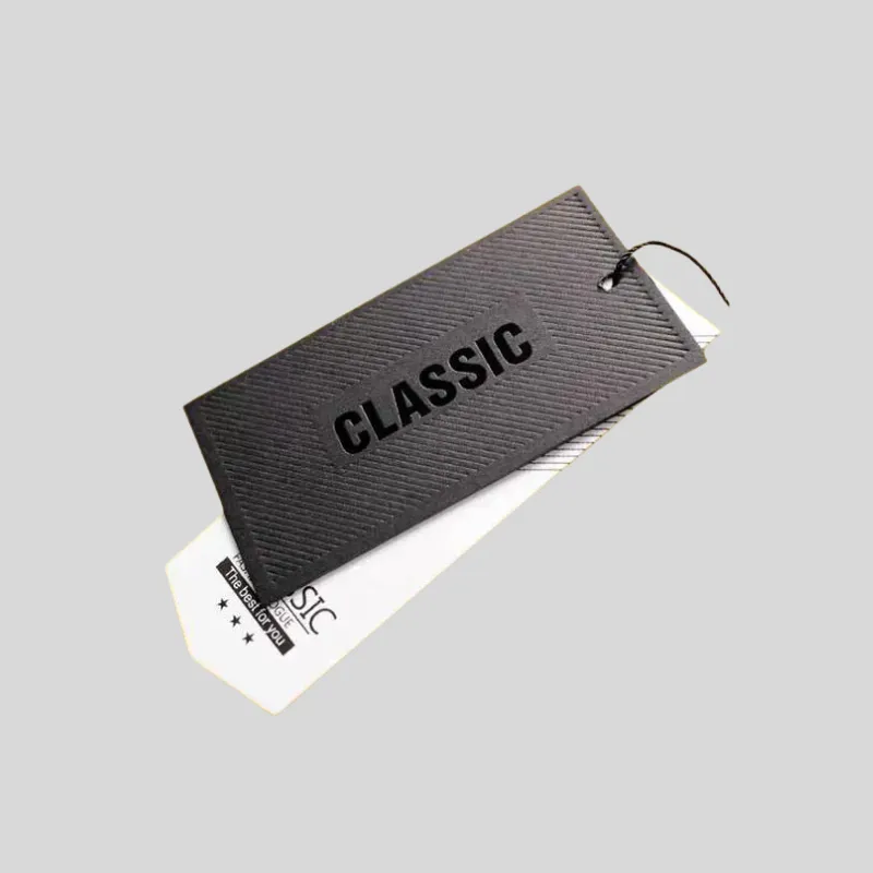 Custom luxury hang tags with thick cardstock and refined branding for high-end retail apparel and goods