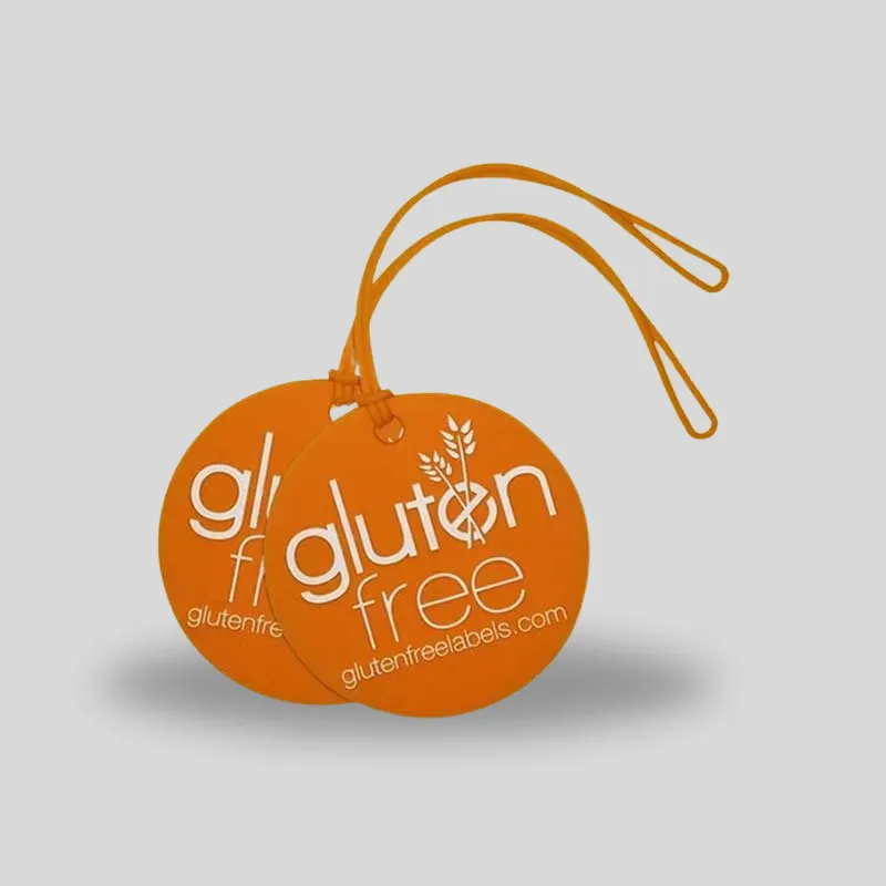 Custom round shaped die-cut hang tags with precision drilled string holes for boutique products