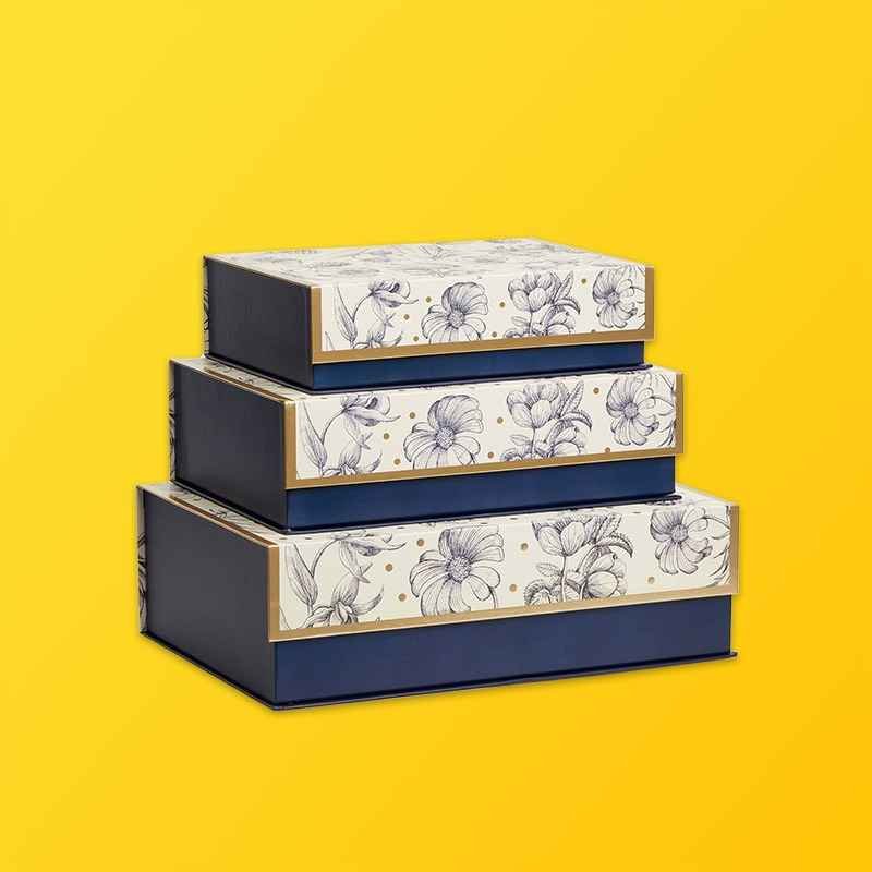 Multi-size nesting gift boxes stacked in graduated dimensions for retail gift sets